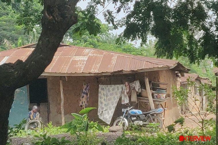 A boy playing with a disused tyre in front of his home in rural Ode Omu, Osun State / Photo credit: Tunde Odediran