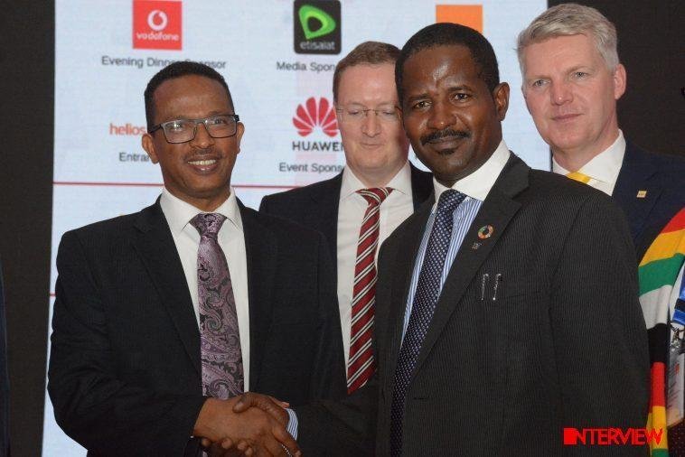 From left: Dr. Getahun Mekuriya the Ethiopian Minister of Innovation and Technology, in Handshake with Dr Bashir Gwandu Fmr. Ag.EVC NCC, after the Keynote Address by Gwandu and Behind are Mr Adrian Hall the COO of Extensia and Mr Jens Schulte-Bockum Group COO MTN, at the IAD 2019 Summit Sheraton Hotel Addis Ababa