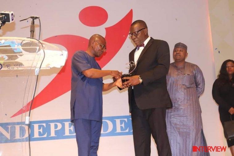 Director, Public Affairs, Nigerian Communications Commission (NCC), Dr. Henry Nkemadu (right) receiving the award at the event / Photo credit: NCC