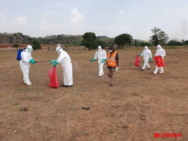 FCTA's decontamination team at Gudu Cemetary after Abba Kyari's Burial on Saturday / Photo credit: Ministry of Information and Culture