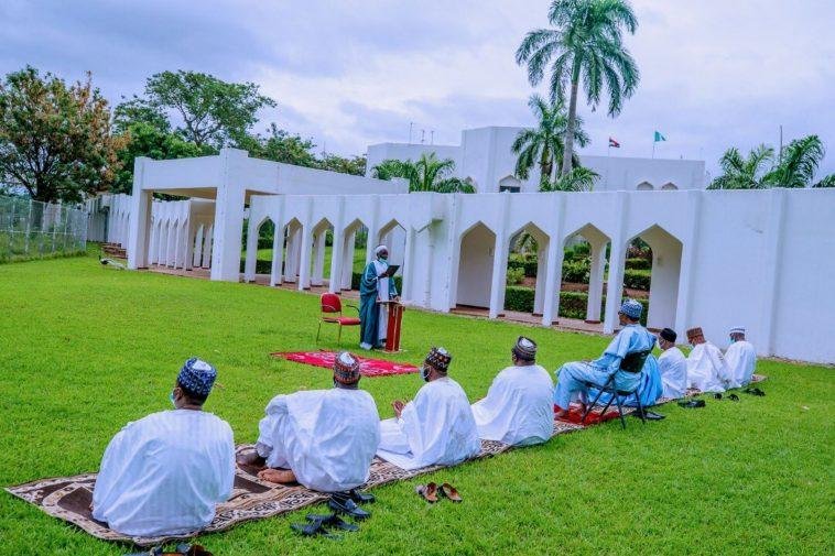 President Muhammadu Buhari (on a chair) during Eid Prayers with others at the Villa, on Sunday / Photo credit: State House