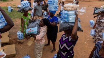 Some women with their -19 food palliatives in Nigeria / Photo credit: businessday.ng