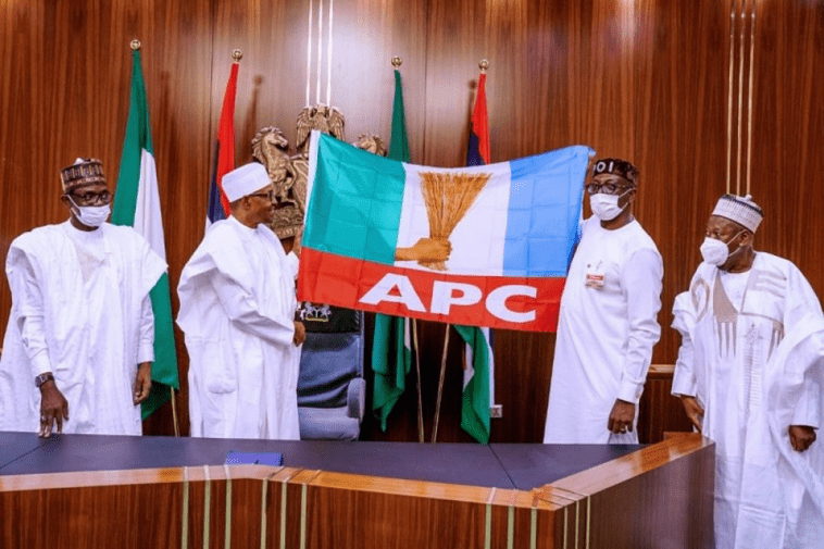 The APC gubernatorial candidate in Edo State receiving the party's flag from President Muhammadu Buhari at the Presidential Villa, Abuja on Friday / Photo credit: Allnews