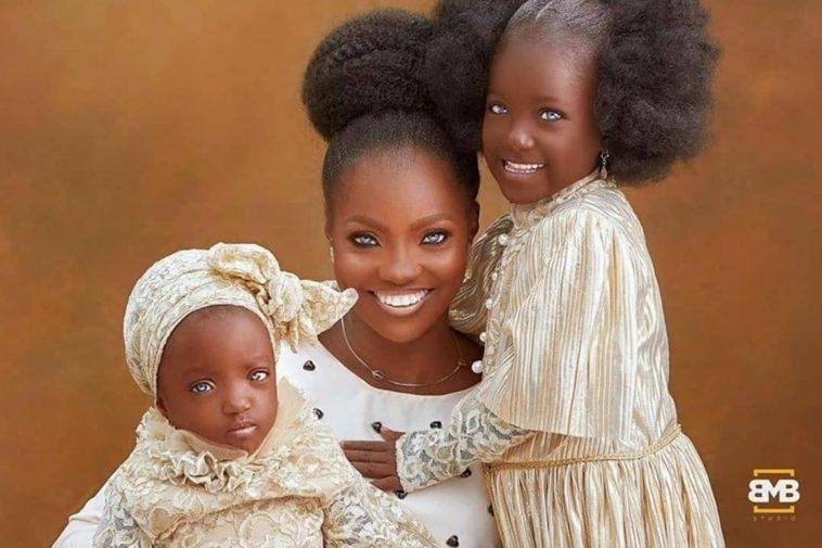 Risikat Azeez, a 30-year-old mother of two and her daughters, who were allegedly abandoned by her husband and father because of their blue eyes have suddenly become celebrities because the rare colour of their eyes / Photo credit: face2faceafrica.com