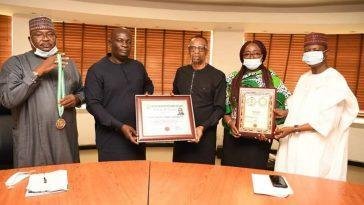 L- R: Bashir Bello, Head, Legislative and Government Relations, Nigerian Communications Commission (NCC); Hon. Uchechukwu Chukwuma, Director General, National Association of State Assembly Legislators (NASAL); Dr. Ikechukwu Adinde, Director, Public Affairs, NCC; Truddy Tony-Awusaku, Principal Manager, Public Affairs, NCC; Hon. Usman Ali, Co-ordinator, North-West Zone, NASAL, during the presentation of National Award of Excellence to Prof. Umar Garba Danbatta, Executive Vice Chairman/CEO, NCC by NASAL at the Commission's Headquarters Abuja. Adidnde received the award on behalf of the EVC / Photo credit: NCC