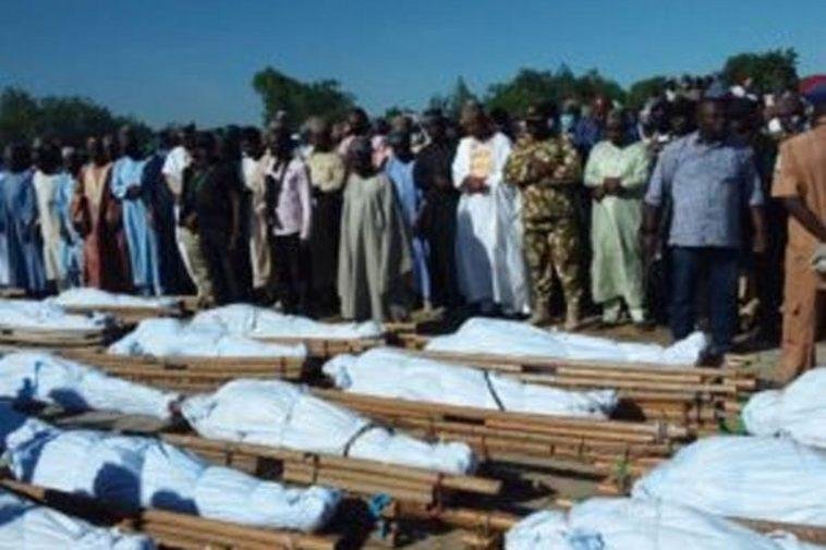 Bodies of the 43 farmers killed in Borno on Saturday during burial / Photo credit: Vanguard