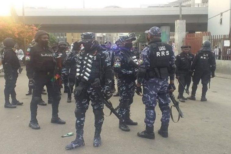 Police operatives at the Lekki Toll Gate Friday evening.