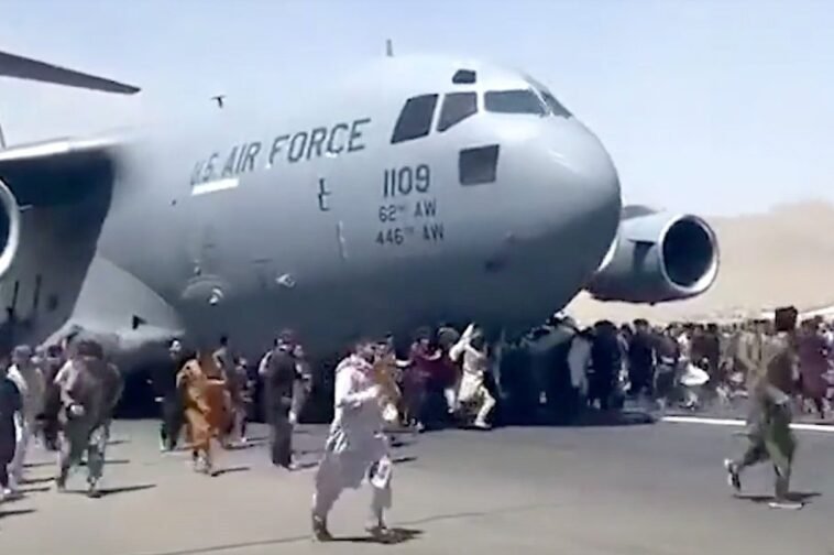 Thousands of people, desperate to flee the country, were still thronging the airport / Photo credit: Reuters