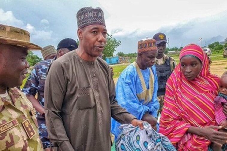 Governor Zulum with the rescued Chibok girl, Hassana Adamu / Photo credit: Peoples Gazette