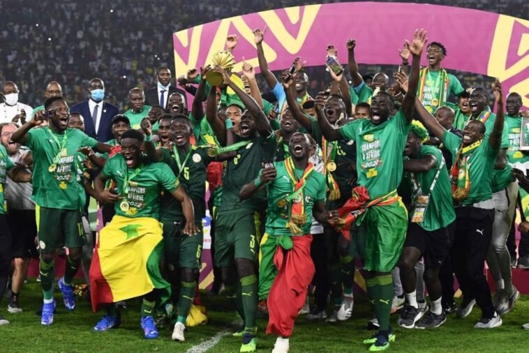 The Lions of Teranga after winning their first AFCON title / Photo credit: CNN