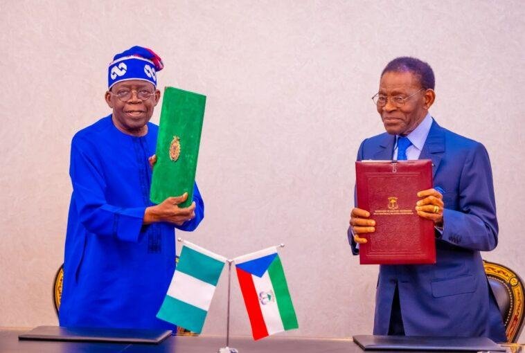 President Bola Tinubu and Equatorial Guinea President, Teodoro Mbasogo, displaying agreement on Gulf of Guinea Pipeline Project signed on Wednesday in Malabo / Photo credit: NAN